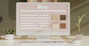 Monitor con scritta Blog su sfondo pastello, tastiera in primo piano e piante decorative sulla scrivania, in un ambiente minimal.